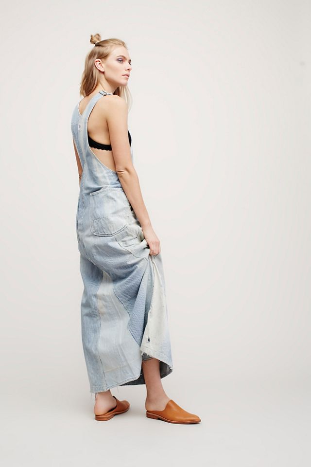 flare overall dress loose fitting denim overall dress with flared hem YonPop