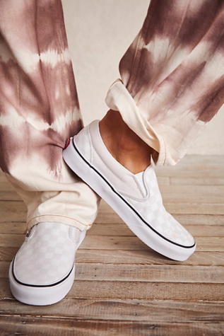 white checkered slip ons