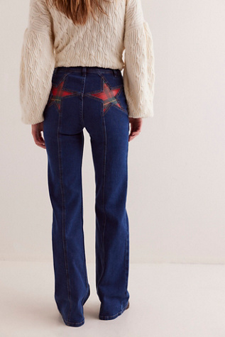 We The Free Firecracker Flare Jeans At Free People In Holiday Tartan, Size: 32