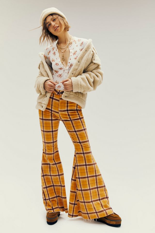 Free People Just Float On Printed Flare Jeans By We The Free in Orange