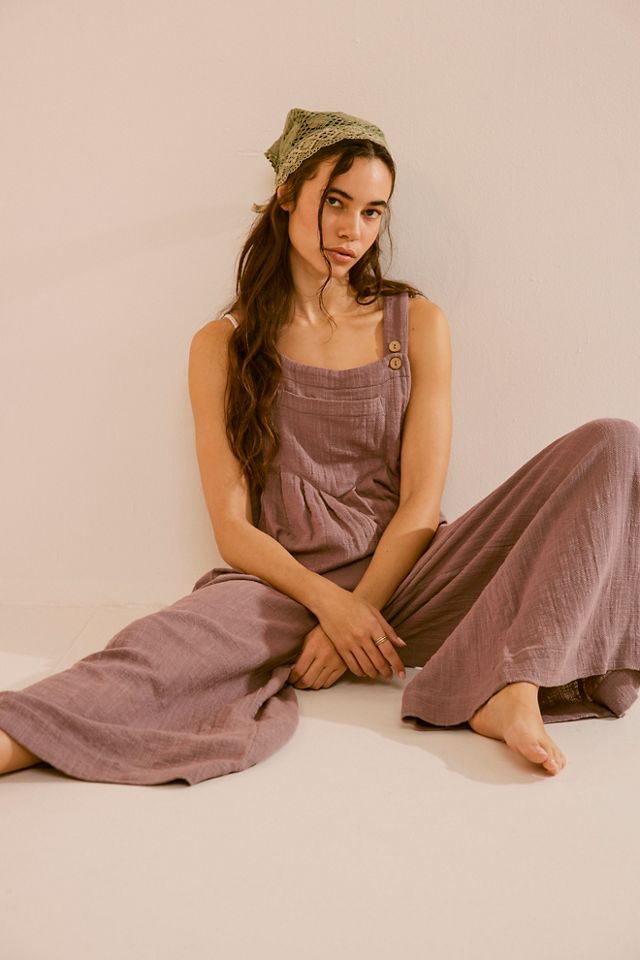 Linen dungarees with coconut buttons opening