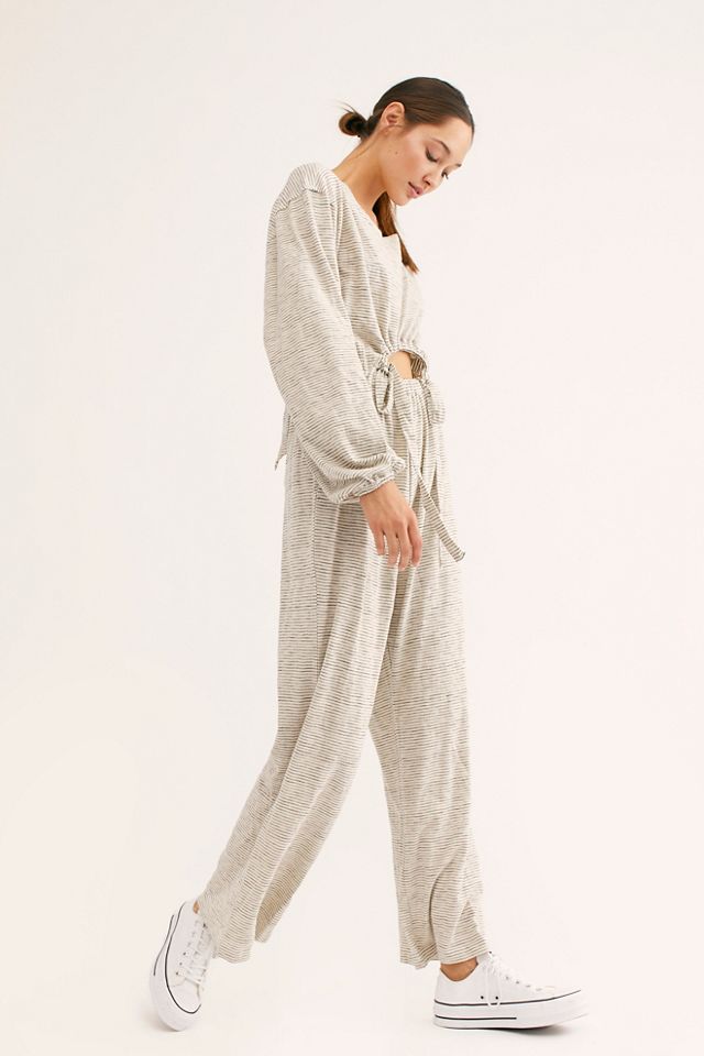 Free people striped jumpsuit on sale