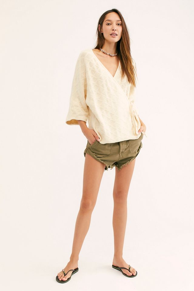 Free people sale faux wrap sweater