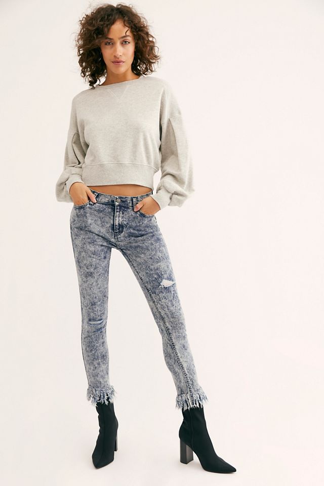 Skinny jeans best sale with frayed bottom