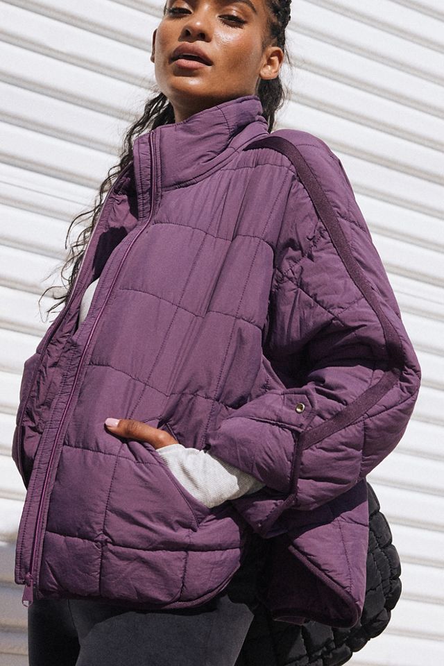 Puffer jacket folds store into pocket