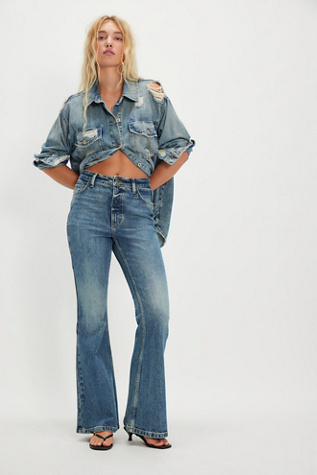 Lee High-Rise Flare Jeans at Free People in Medium Wash, Size: 27