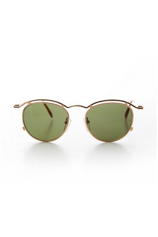 Vintage Axl Sunglasses Selected by Sunglass Museum at Free People in Gold