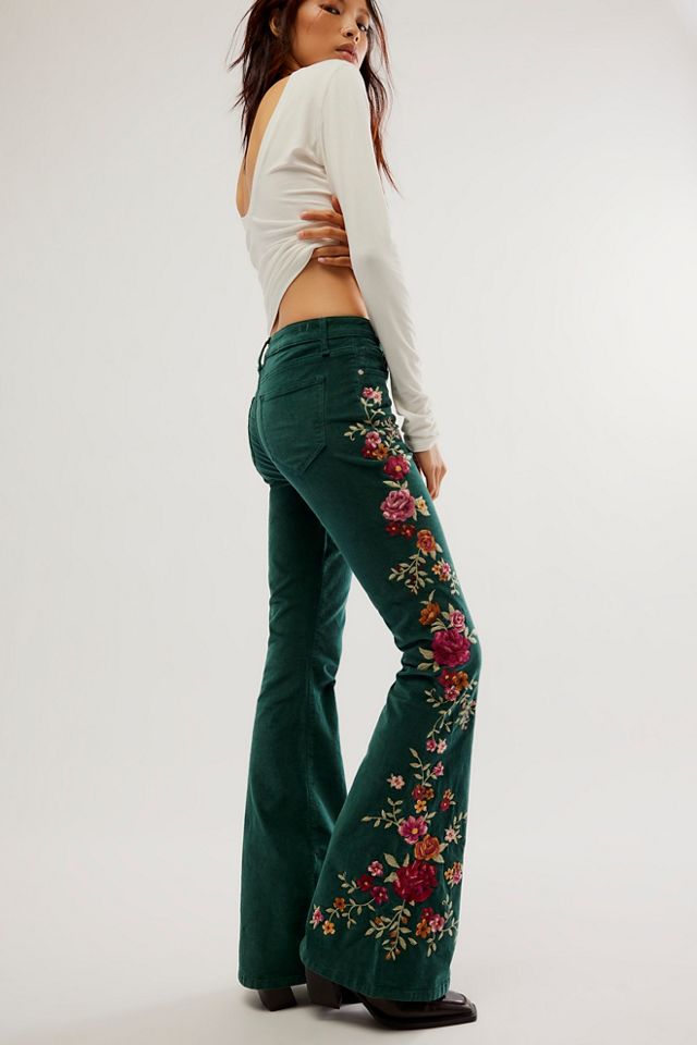 Free People paisley print velvet low rise flares in emerald green