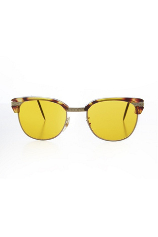 Vintage True Sunglasses Selected by Sunglass Museum at Free People in Brown