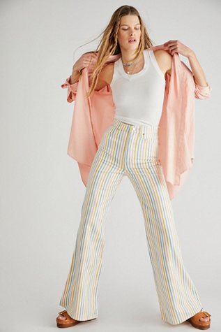 Free People Wrangler Wanderer 626 High-Rise Flare Jeans. 1