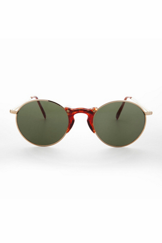 Vintage Ziggy Sunglasses Selected by Sunglass Museum at Free People in Gold