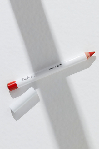 Coco Lip Crayon by Ere Perez at Free People in Spark Bright Orange Red