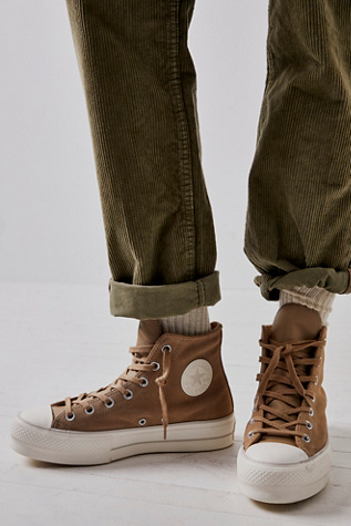 cozy brown platform converse