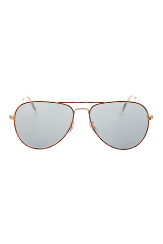 Vintage Merlin Sunglasses Selected by Sunglass Museum at Free People in Brown