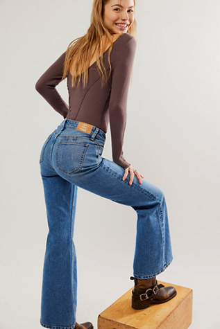 CRVY Vintage High-Rise Flare Jeans by We The Free at Free People in Medium Wash, Size: 34