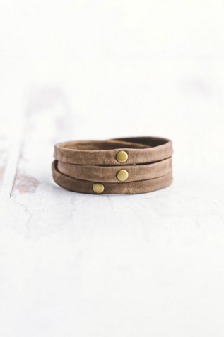 Giving Bracelets Antique Brass Triple Warrior Wrap Leather Bracelet at Free People in Grey