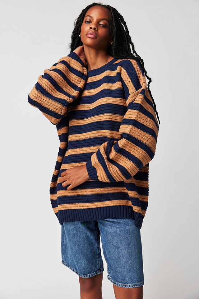 Pullover sweater with outlet hood