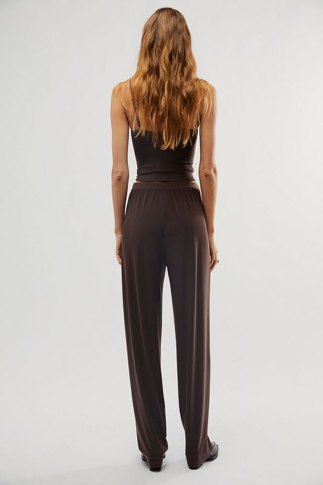 Norma Kamali Tapered Pleated Trousers | Free People
