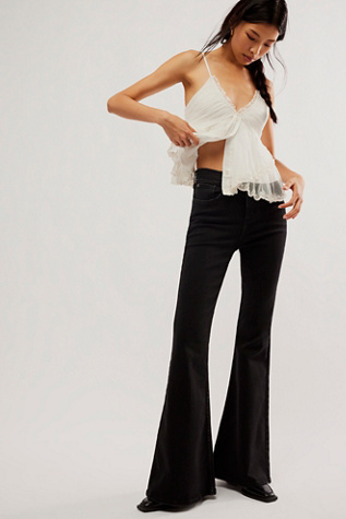 Lee High-Rise Ever Fit Flare Jeans at Free People in Black, Size: S
