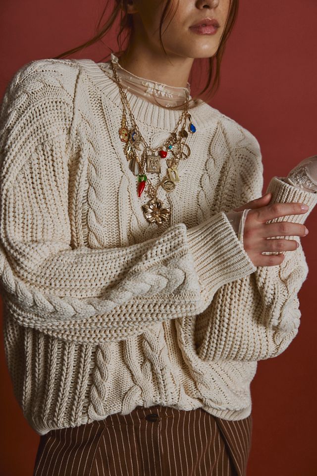 Free People shops Distressed Cable Knit Sweater