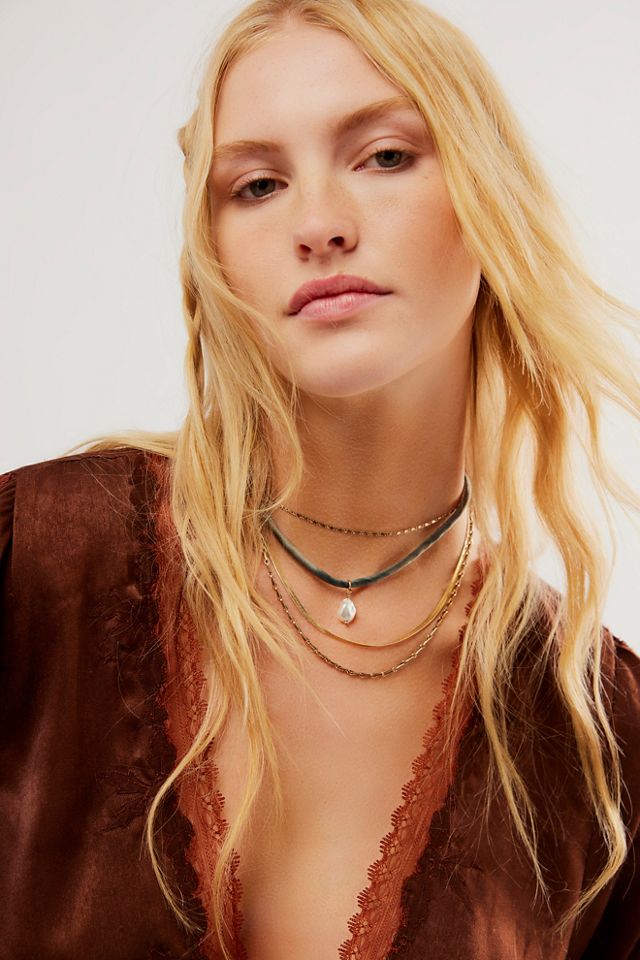 Collier orbe multirangs #1