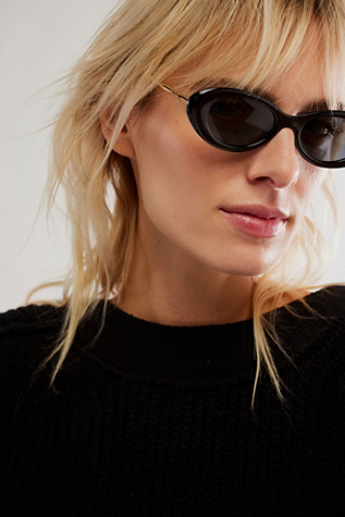 Ella Slim Oval Sunglasses at Free People in Black