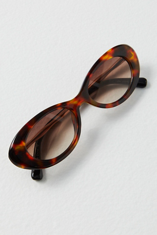 Ella Slim Oval Sunglasses at Free People in Mosaic Tort