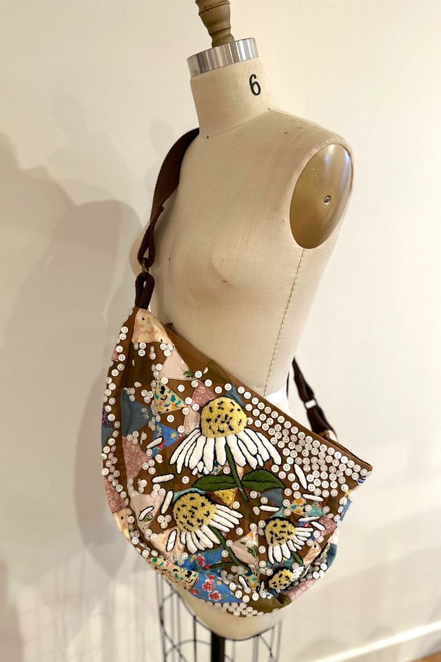 Daisy sling bag hotsell