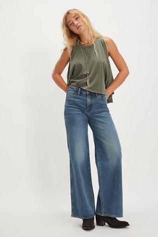 Wrangler World Wide Mid-Rise Wide-Leg Jeans at Free People in Medium Wash, Size: 27