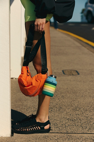 Bulls Eye Sling Bag At Free People In Tangerine