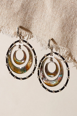 Suncatcher Hoops at Free People in Dark Moody