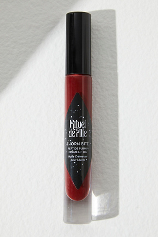 Rituel de Fille Thorn Bite Peptide Plump Crème Lip Oil at Free People in Black
