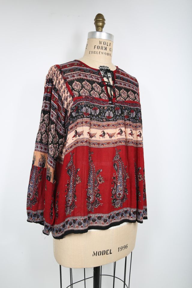 It's all about that must have red bohemian blouse! Here's where to get it.