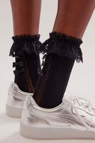 Mini Bow Sheer Ruffle Crew Socks at Free People in Black