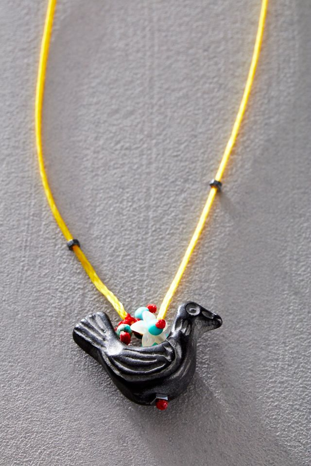 Collier oiseau en pierre sculptée River Song #1