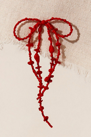 Say You Love Me Bow Dangle Earrings at Free People in Red