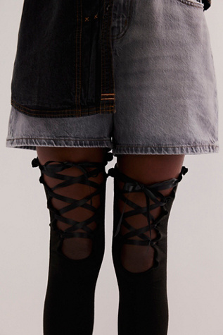 Ticked And Tied Over The Knee Socks at Free People in Black