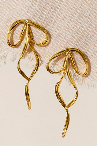 By Nubyen Pirouette Bow Earrings by Free People in Gold