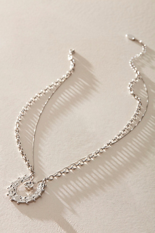 Lucky Loop Necklace at Free People in Silver