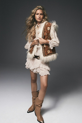 Understated Leather Embroidered Fur Vest