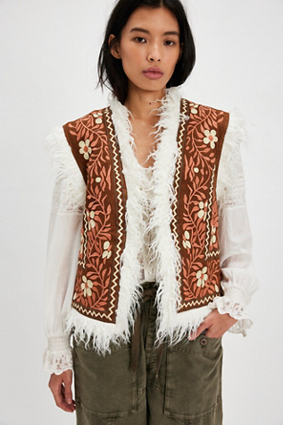 Understated Leather Embroidered Fur Vest