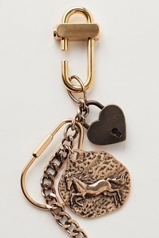 Charmed Strand Bag Charm At Free People In Antique Gold