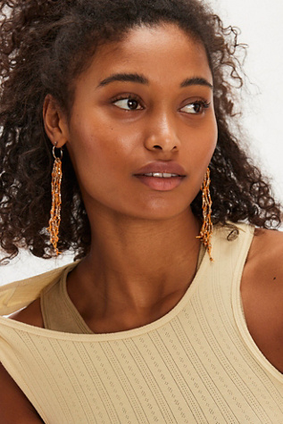 Badlands Dangle Earrings at Free People in Papaya