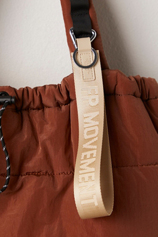 There It Is Keychain by FP Movement at Free People, Off White