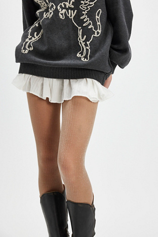 Stardust Sparkle Tights par Hansel From Basel en Champagne, pour femme chez Free People