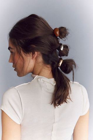 Acrylic Pony Cuff by Free People in Brown