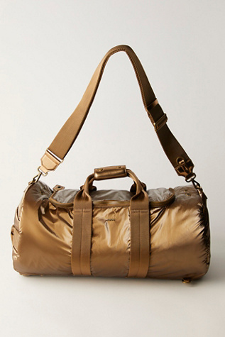 Caraa Remus Duffle Bag At Free People In Gold