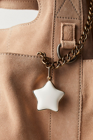 Puffy Star Bag Charm At Free People In Gold