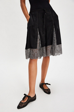 Ballerines tissées avec un nœud par Intentionally Blank en Noir, pour femme taille: US 7 chez Free People