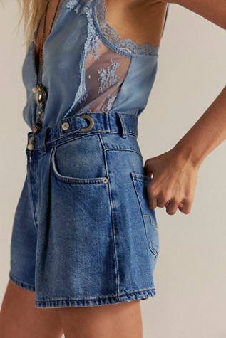 CRVY Moon Sign Pleated Shorts